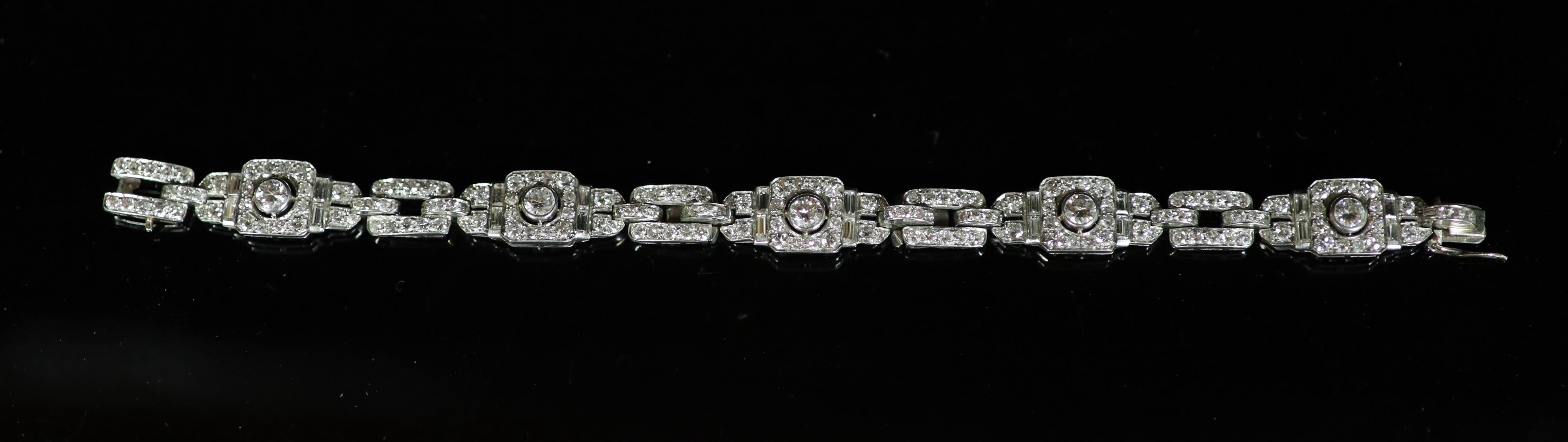 A mid 20th century platinum and diamond encrusted rectangular link bracelet